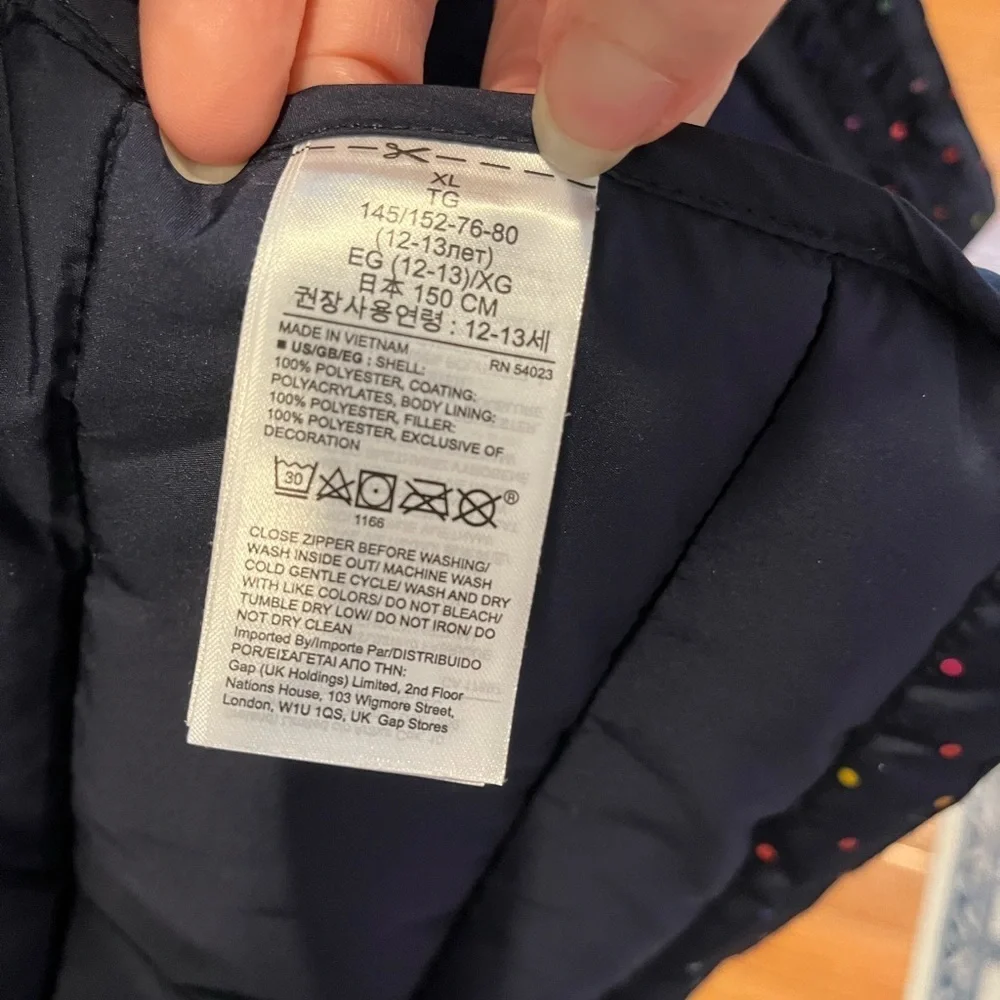 Girls navy puffer vest by Gap, Size XL